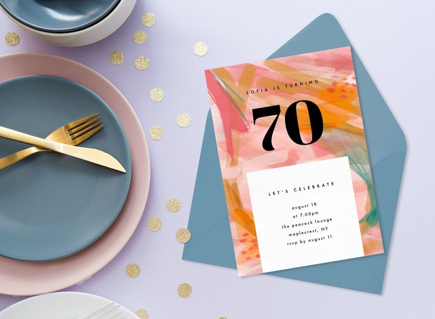 70th birthday party ideas: 70th birthday invitation on a table
