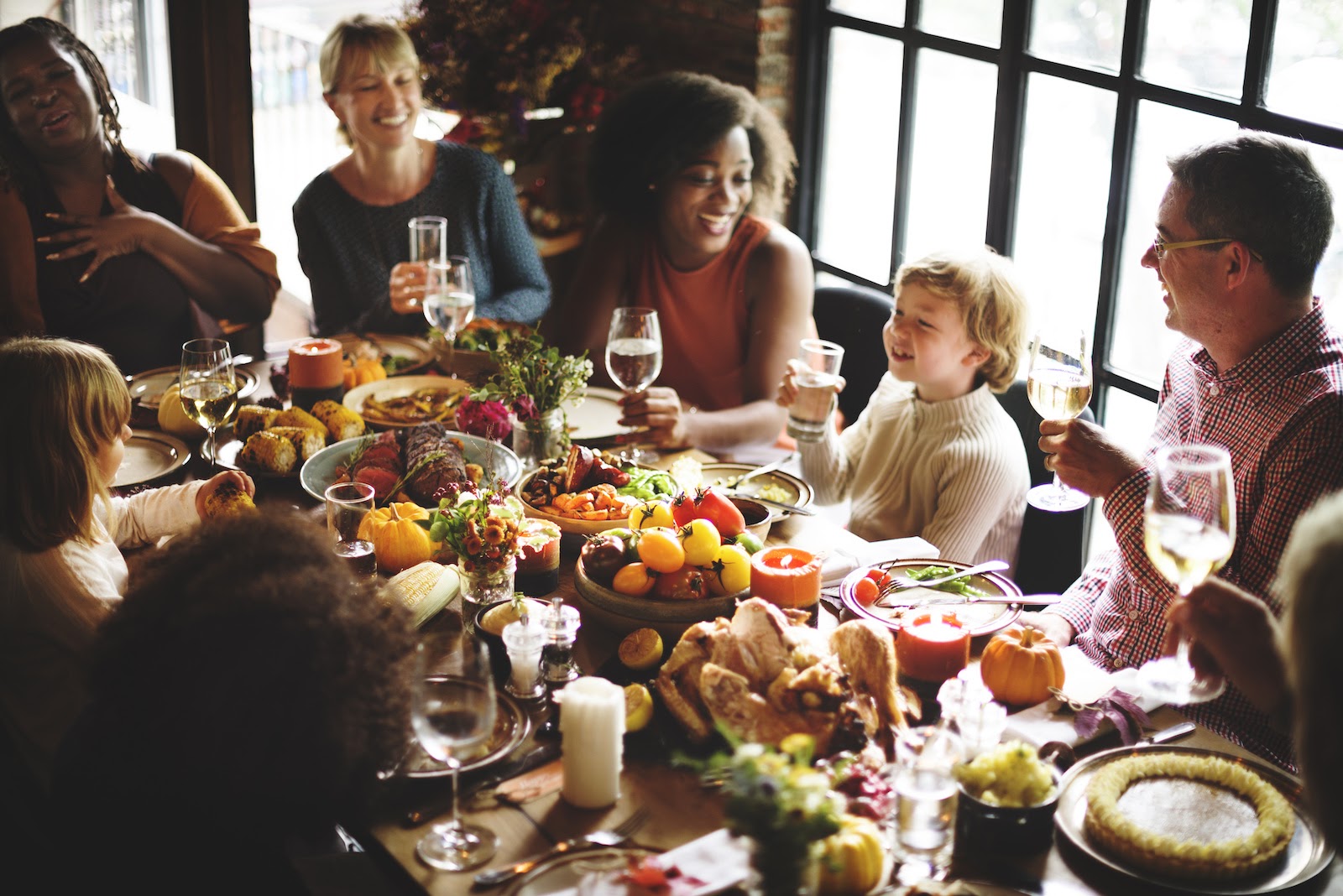 Friends and family enjoying a Thanksgiving gathering.