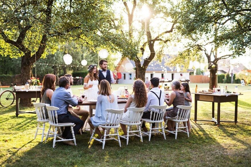Small wedding ideas: A backyard reception with only one family-size table of guests