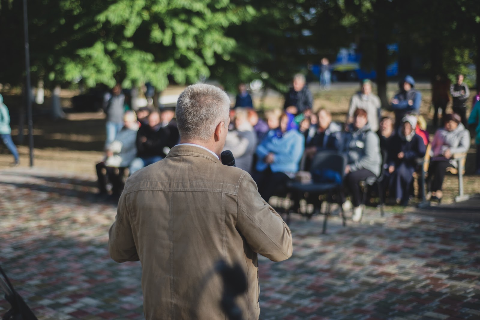 Man speaking at a groundbreaking ceremony