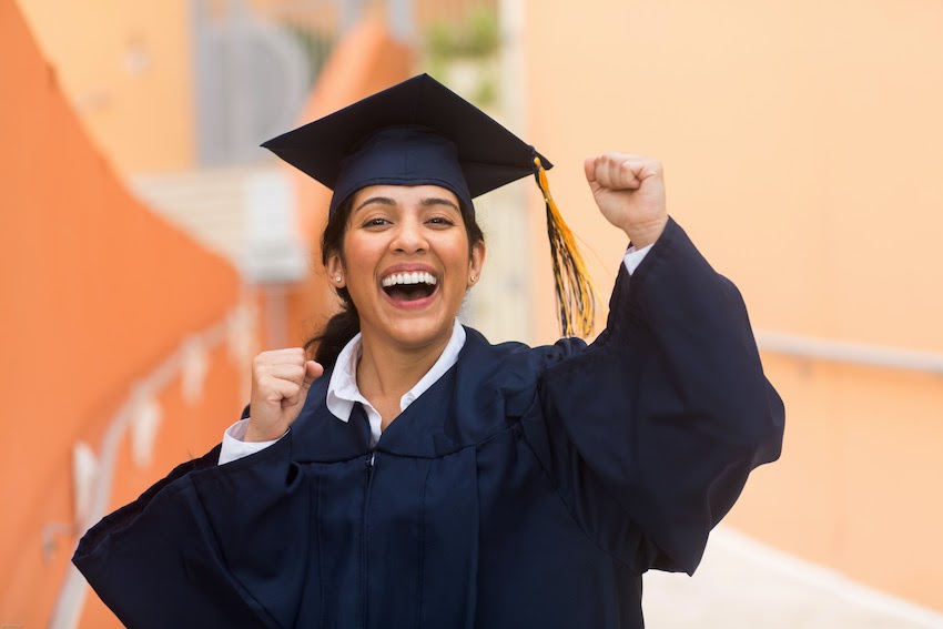 Female Graduates In Red Gown And White Streamers Custom Graduation