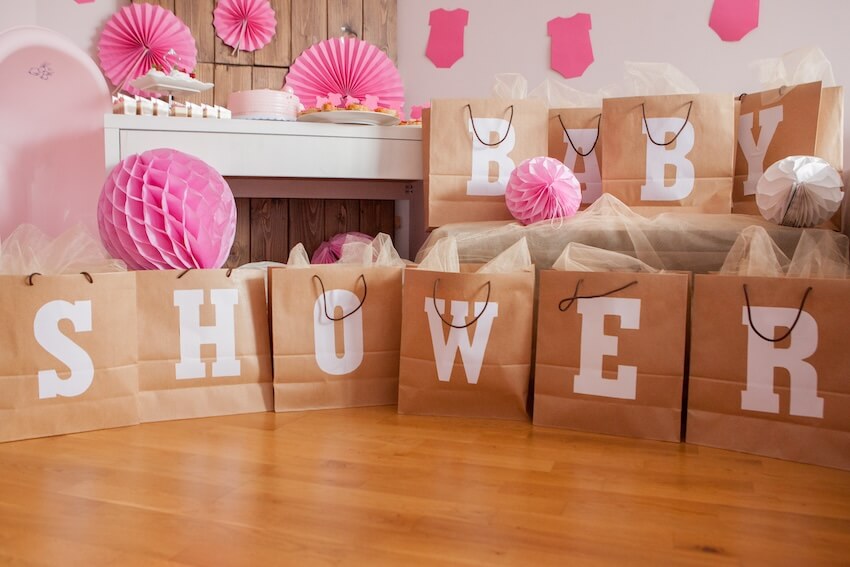 Baby shower prize ideas: BABY SHOWER spelled using brown paper bags