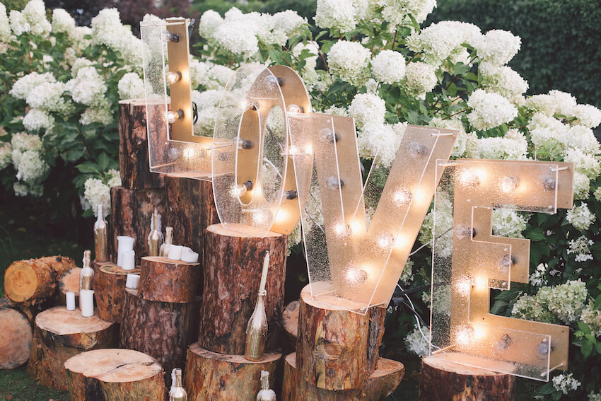Outdoor wedding decorations: LOVE sign with lights
