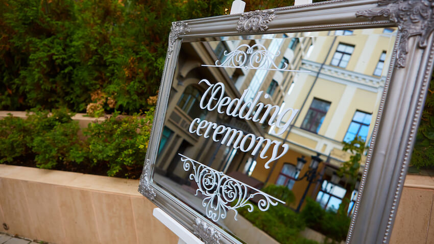 Wedding ceremony sign on a mirror