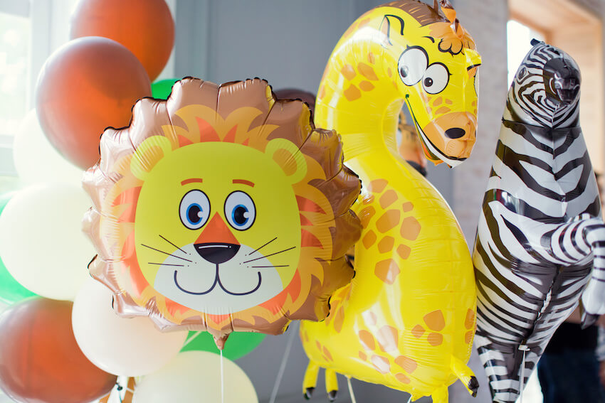 Wild one birthday theme: animal balloons at a birthday party