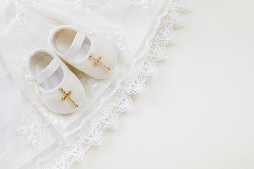Baby christening: baby dress and baby shoes