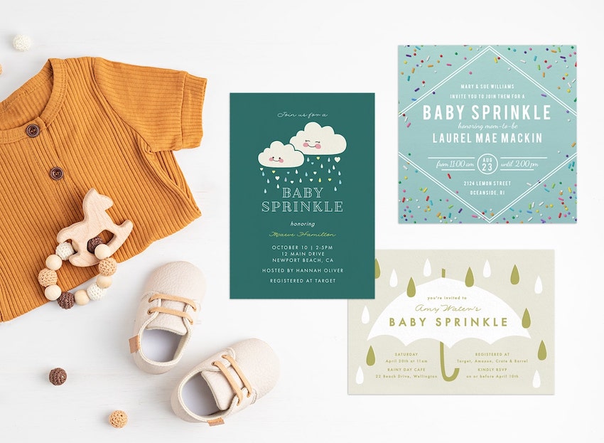 Sprinkle baby shower: baby shower invitations, a baby top, and a pair of baby shoes