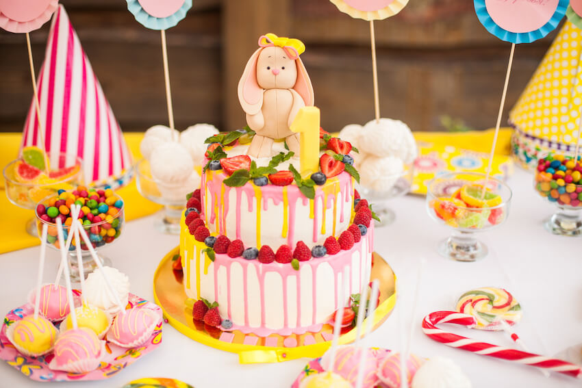 Birthday cake and desserts on a table