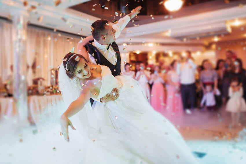 Traditional wedding: bride and groom dancing at their reception