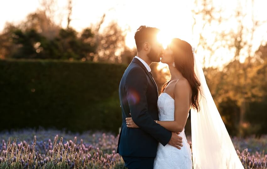 Beautiful bride and groom kissing