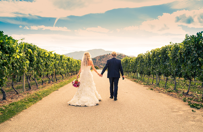 destination wedding ideas: bride and groom walking