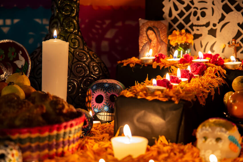 Candles and fruits for Dia de los Muertos celebration