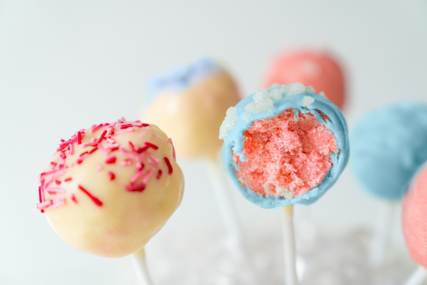 Gender reveal ideas: close up shot of colorful lollipops