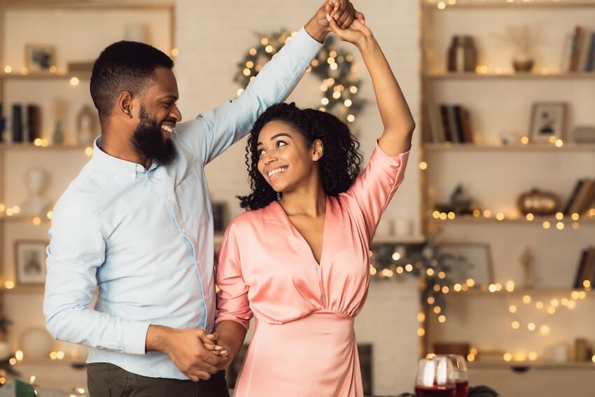 Couple dancing at home