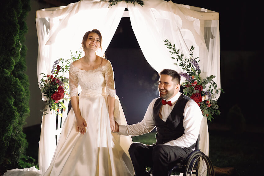 Elopement party: couple happily holding hands