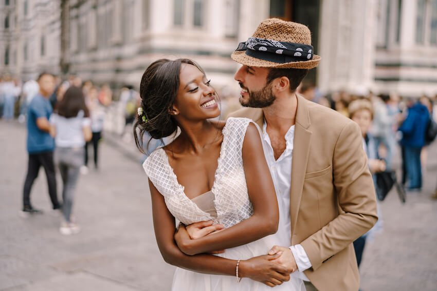 Elopement party: couple hugging while looking at each other