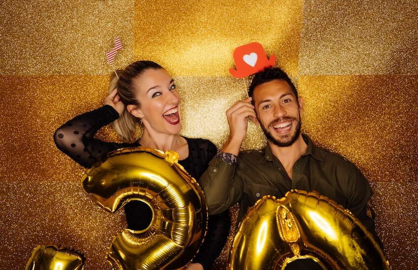 30th birthday invitations: couple posing for a photo