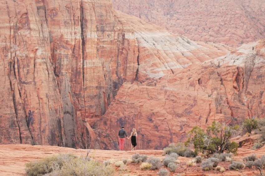 National park wedding: couple walking on a rocky mountain