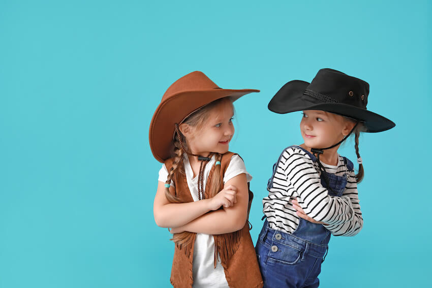 Western theme party: cute girls wearing cowboy hats