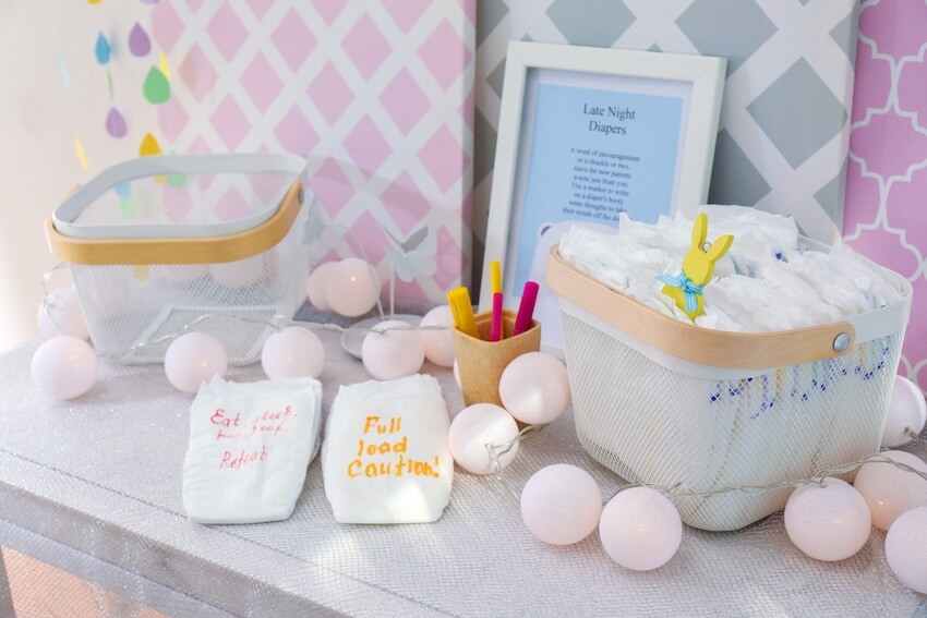 Coed baby shower games: diapers in a basket