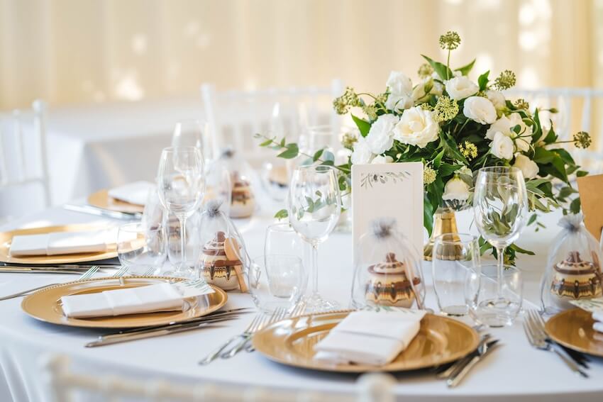 Dinner table setting with flowers