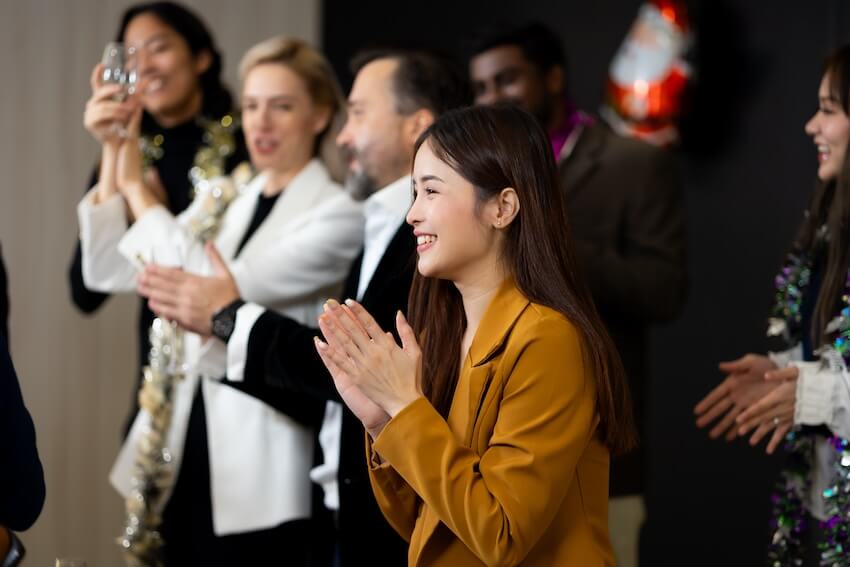 Employees clapping their hands