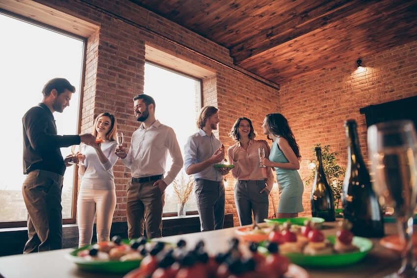 Employees mingling at a party