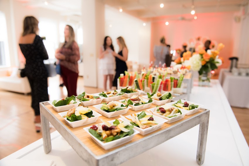 Event planning: A gallery event with small plates of food