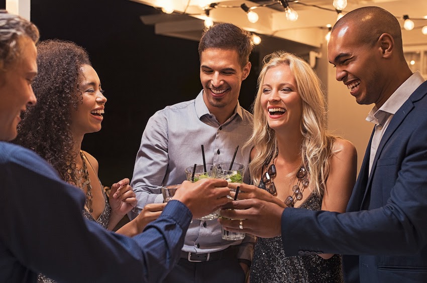 Event planning: A group of attendees raising their glasses