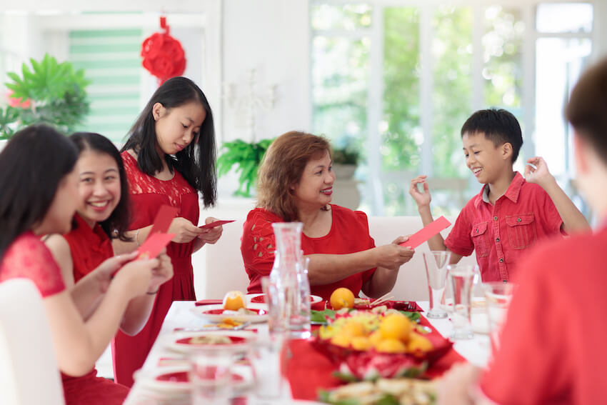 Chinese New Year greetings: family celebrating the Chinese New Year