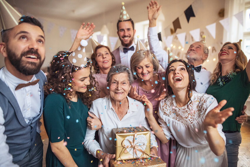 75th birthday decorations: family celebrating their grandmother's birthday