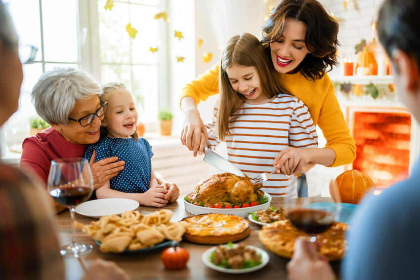Thanksgiving greetings: family happily celebrating Thanksgiving