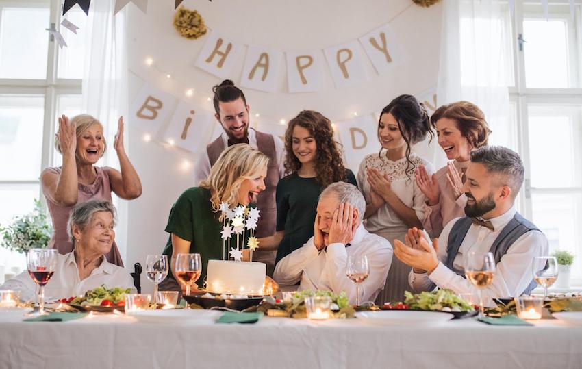 Happy birthday wishes for him: family happily celebrating a birthday