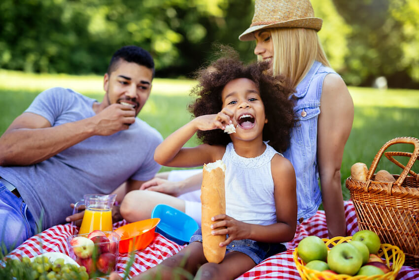 Picnic invitation: family having a picnic