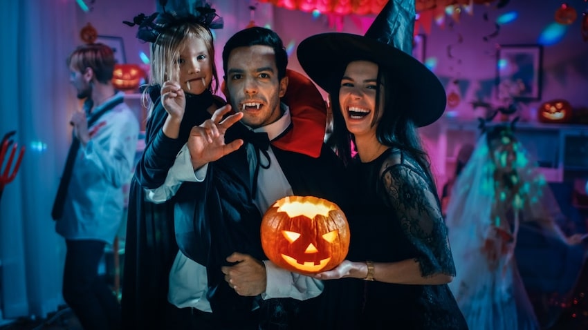 Family wearing different Halloween party ideas and costumes