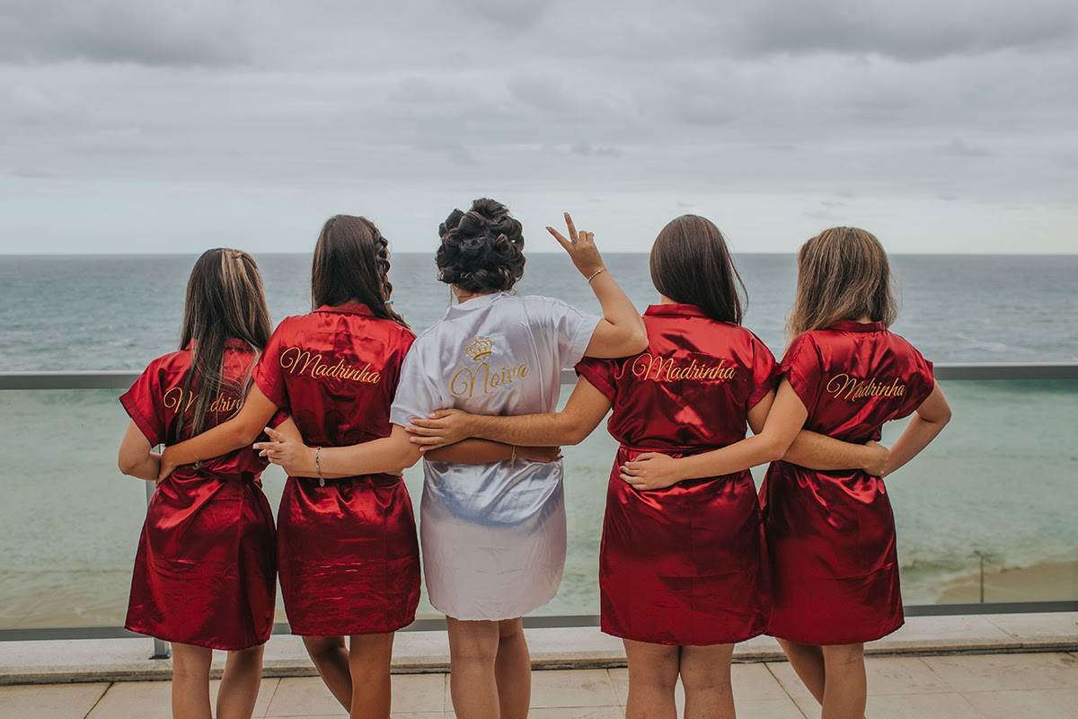 A Bride and her bridesmaids in matching robes