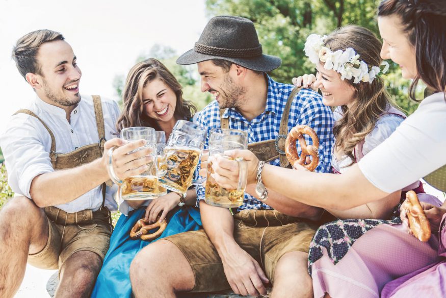 Friends drinking beer during Oktoberfest