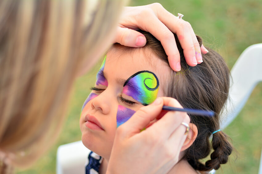 Toddler birthday party ideas: girl getting her face painted