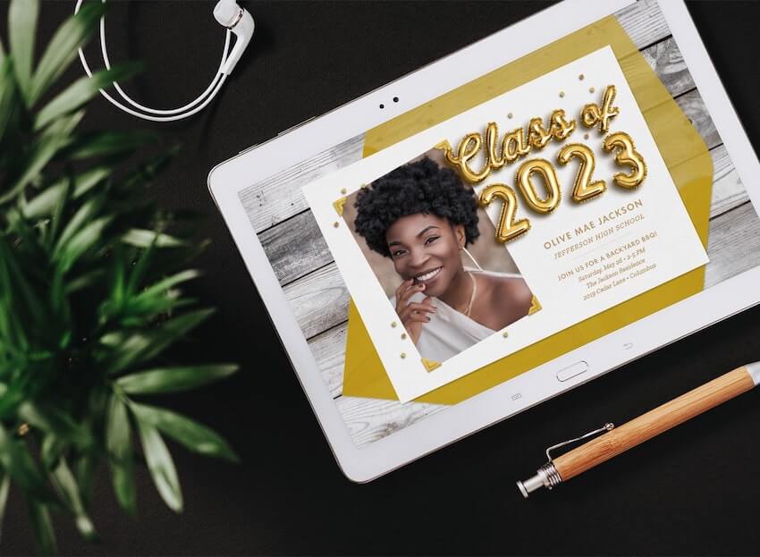 Backyard graduation party ideas: graduation party invitation on a tablet screen