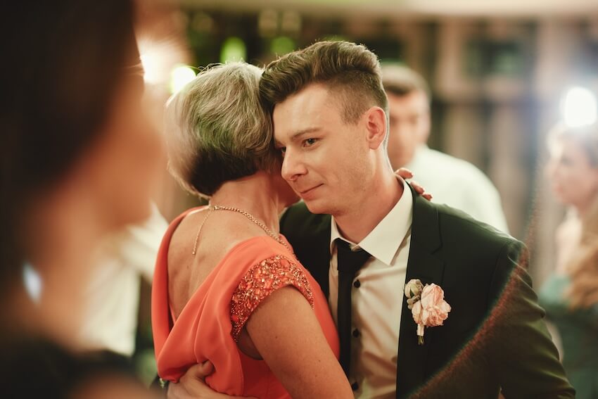 Mother son wedding songs: groom and his mom dancing at his wedding
