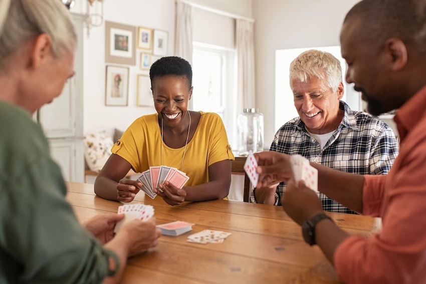 Group of friends playing cards