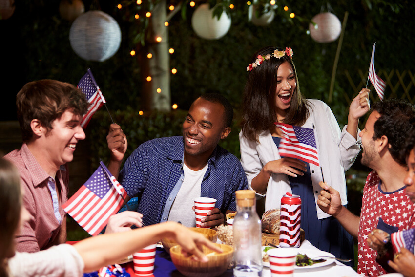 4th of July traditions: group of people celebrating Independence Day
