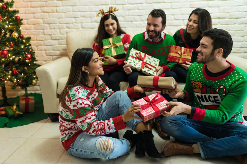 Group of people exchanging gifts