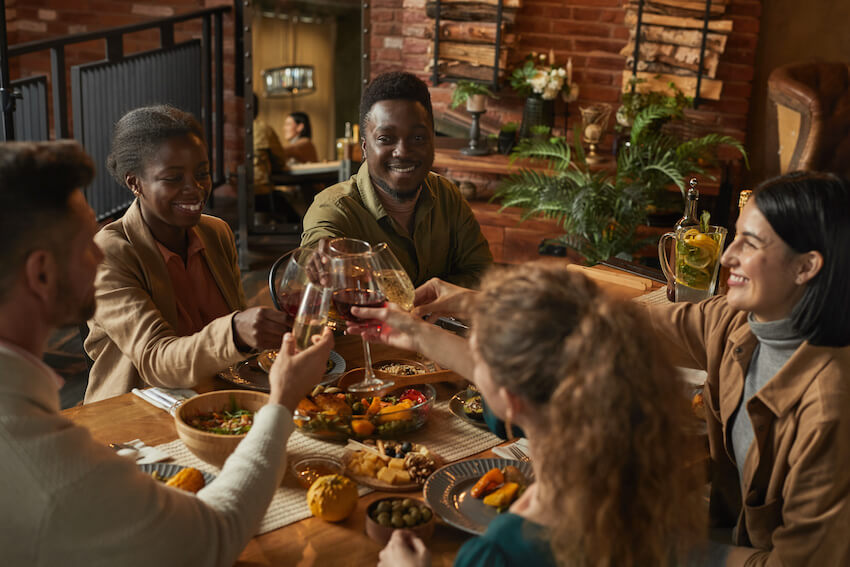 Thanksgiving greetings: group of people having a toast