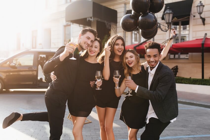 Farewell party invitation: group of people posing at the camera