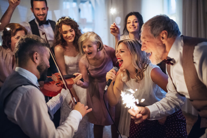 Wedding after party: group of people singing together