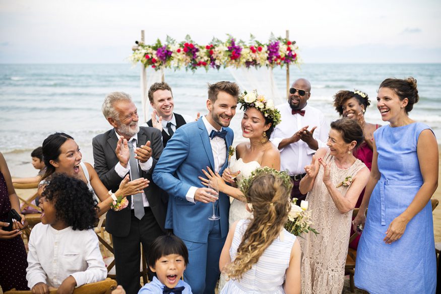 group of people with the newly weds