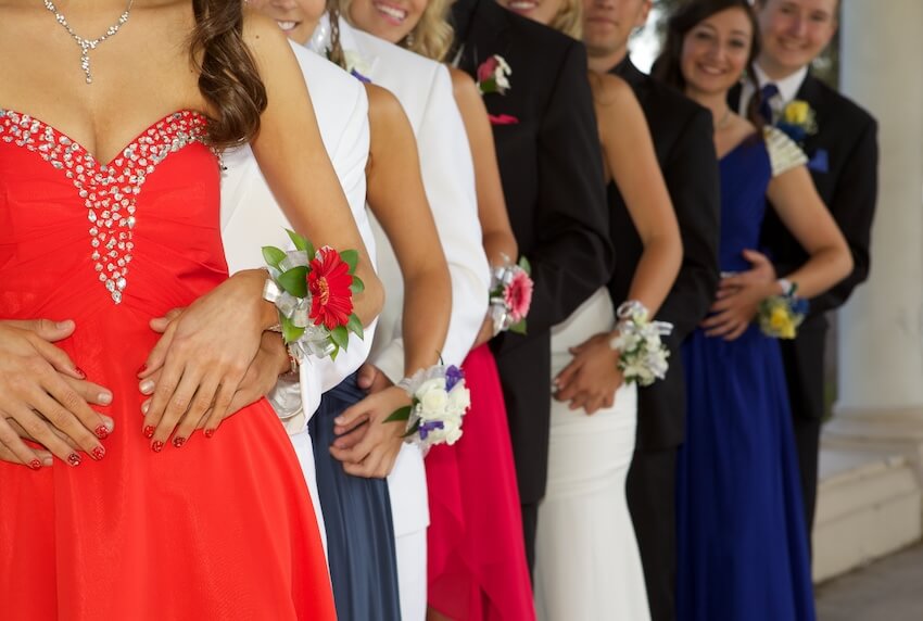 Prom invitations: group of teenagers attending a prom