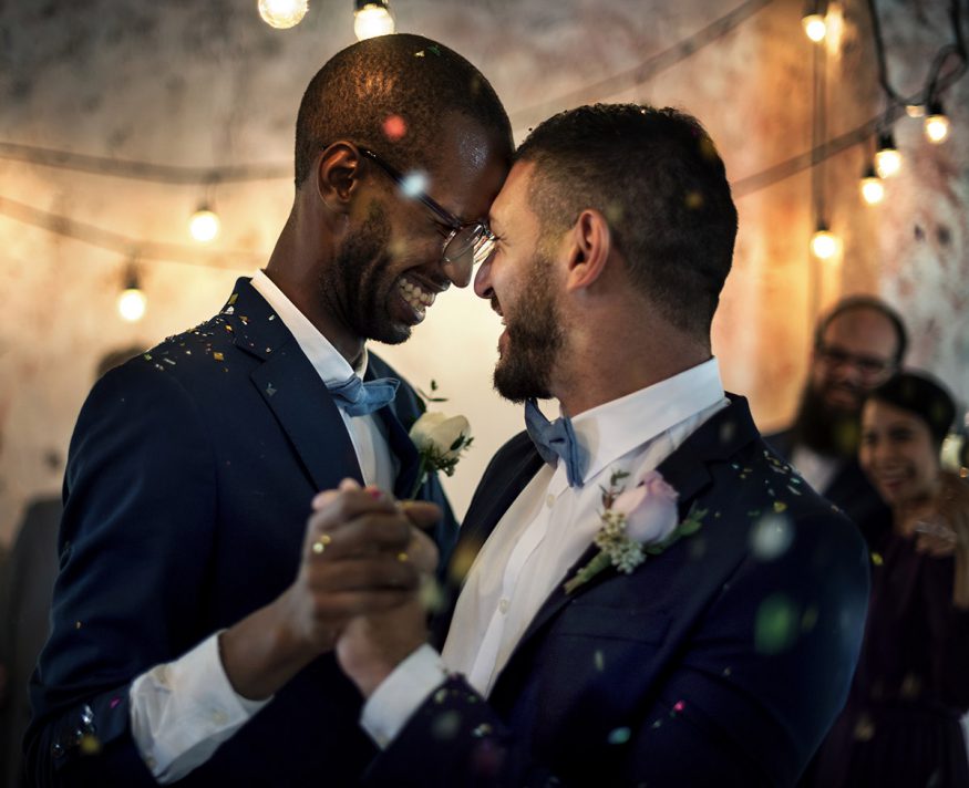 wedding invitation sets: happy couple dancing on their wedding day