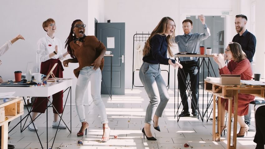 https://cdn.greenvelope.com/blog/wp-content/uploads/happy-employees-celebrating.jpeg?utm_source=chatgpt.com